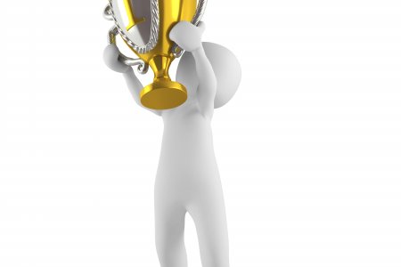 Der Diakoniepreis 2015 ist ausgeschrieben. (c) Pixabay/Peggy und Marco Lachmann-Anke Eine grafische Figur hält einen Pokal hoch.